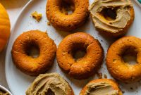 Perfectly Spiced Vegan Pumpkin Donuts with SunButter Maple Frosting
