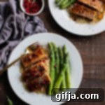 Rosemary Balsamic Tofu Delight 7 Rosemary Balsamic Glazed Tofu on a plate with asparagus and quinoa