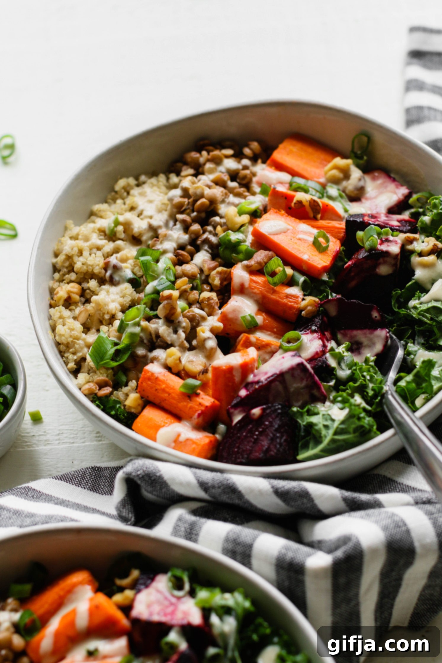 Crimson Root Wellness Bowl 8 Roasted Beet Macro Bowl served in bowl with a fork by Flora & Vino