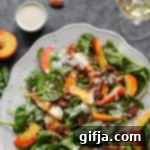 Peaches and Quinoa Salad with Pinot Grigio 11 Delicious Peaches 'N' Quinoa Salad by Flora & Vino, a perfect summer meal.