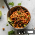 Sweet Potato Noodles with Spicy Almond Butter Sauce 8 A small bowl of Spicy Almond Butter Sweet Potato Noodles