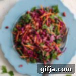 Ruby Red Bean Pomegranate Salad 8 Appetizing Red Bean & Pomegranate Salad with Yogurt Tahini Dressing on a plate