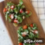 Tempeh Avocado BLT Toast 8 Tempeh, Lettuce, Avocado, & Tomato (TLAT) Toast with cashew mayonnaise.