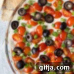 Ultimate Vegan 7-Layer Mexican Dip 10 A vibrant Vegan 7-Layer Mexican Dip, ideal for healthy snacking and entertaining.