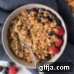 Creamy Coconut Quinoa Breakfast Bowl 11 A bowl of creamy Coconut Quinoa Porridge with toppings, ready to eat.