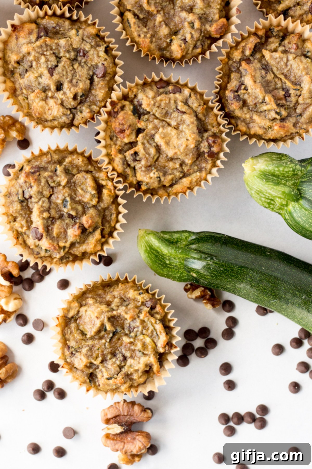 Super moist and delicious vegan and gluten-free zucchini SunButter chocolate chip muffins, perfect for a healthy snack.