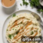 Whipped Cauliflower Puree with Rich Almond Butter Sauce 12 Cauliflower Mashed Potatoes with Almond Butter Gravy