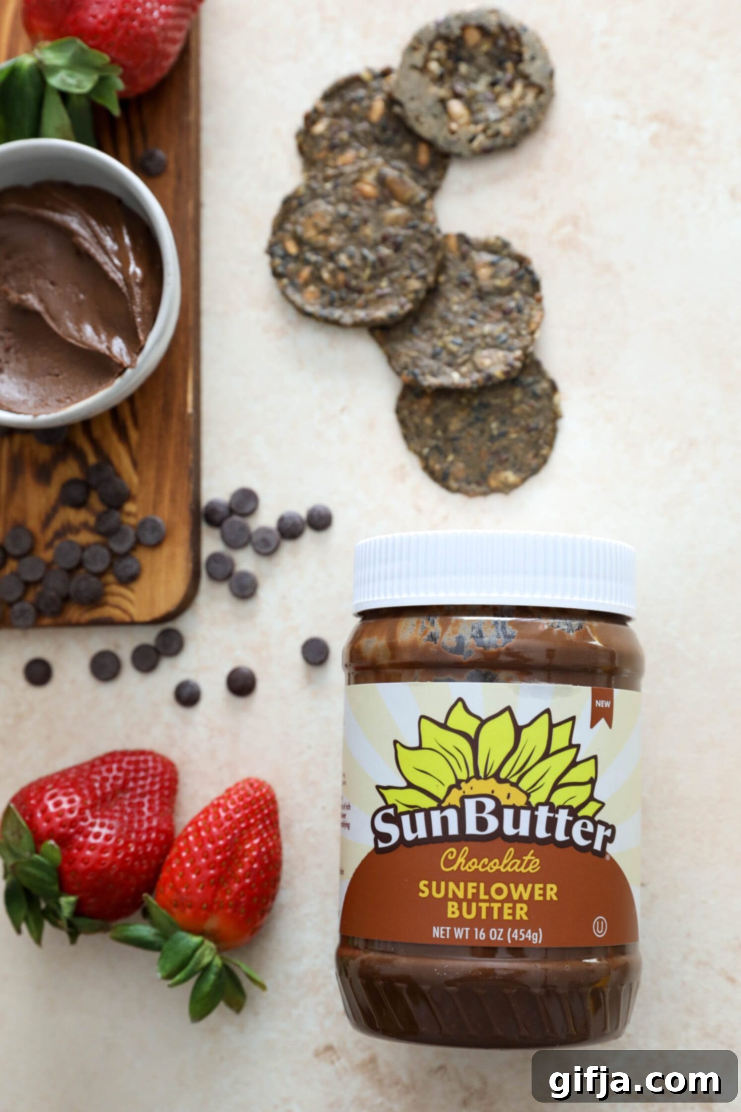 chocolate Sunbutter with crackers, strawberries, and dark chocolate chips by Flora & vino