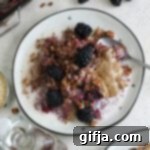 Berry Bliss Quinoa Bake 10 A small image of the finished Blackberry Baked Quinoa, served with toppings.
