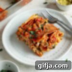 Plant-Based Lasagna with Creamy Tofu Ricotta 14 A baked portion of Vegan Vegetable Lasagna, showcasing its appealing layers