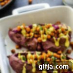 Purple Sweet Potatoes with Golden Turmeric Tahini Filling 9 Stuffed Purple Sweet Potatoes with Tandoori Chickpeas & Turmeric Tahini