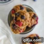 Berry Burst Banana Muffins 10 Delicious Triple Berry Banana Muffins ready to eat