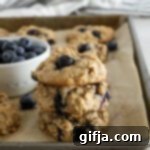 Grab-and-Go Blueberry SunButter Cookies 12 Blueberry SunButter Breakfast Cookies stacked, ready to eat.