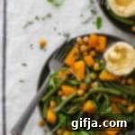 Hearty Butternut and Chickpea Bake 8 Butternut Squash and Chickpea Bake with green beans, a healthy and easy one-pan vegan meal