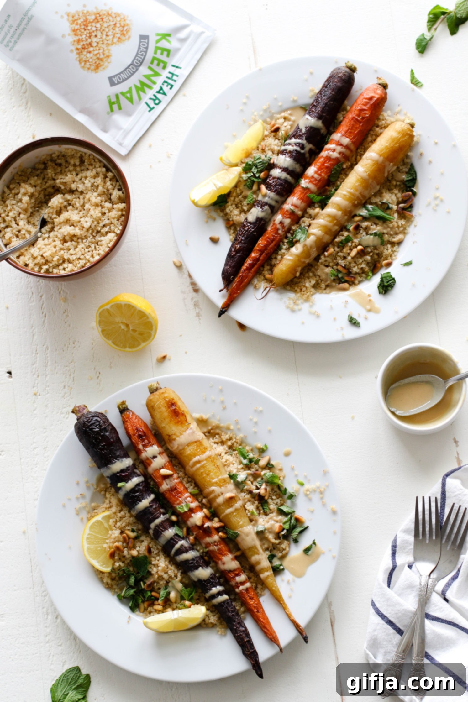 Vibrant Roasted Carrots 8 Rainbow Roasted Carrots served on plates over quinoa with fresh lemon, shredded mint, toasted pine nuts, and drizzle of tahini