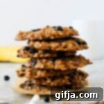 Wholesome Blueberry Banana Morning Bites 8 Blueberry Banana Breakfast Cookies on parchment paper