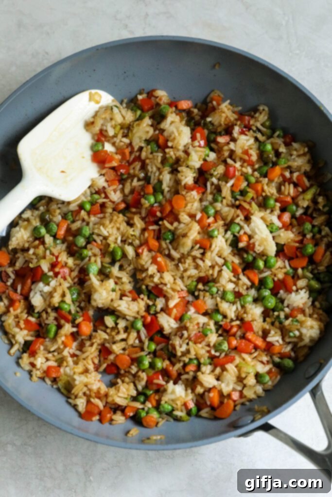 Solo Fried Rice Delight 7 Single Serving Fried Rice in pan with spatula