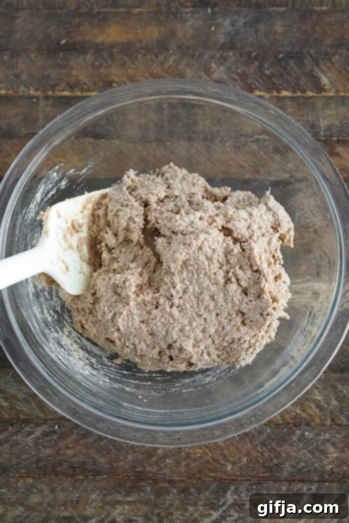 Vegan Bratwurst mix in bowl with spatula