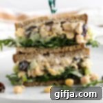 Finished Cranberry Chickpea Salad Sandwich with all toppings