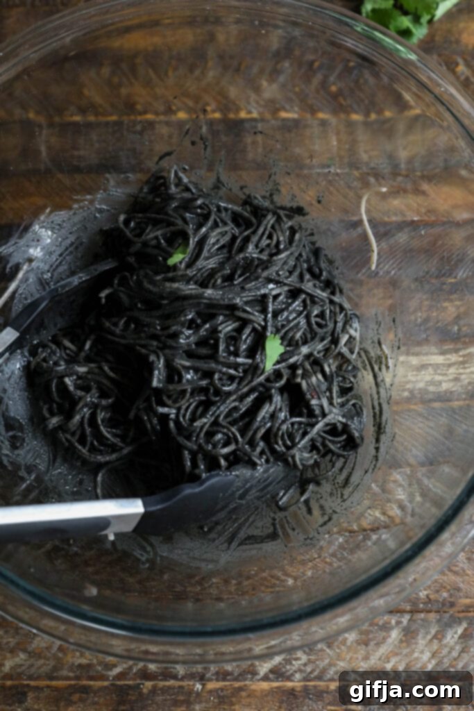 Midnight Sesame Noodle Bowl 7 Soba noodles generously mixed in black sesame butter sauce, ready to absorb all the rich flavors.