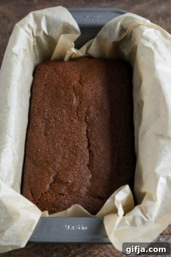gingerbread loaf baked in parchment lined bread pan