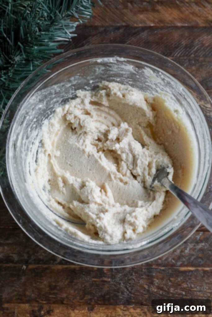 vegan cream cheese frosting mixed in bowl